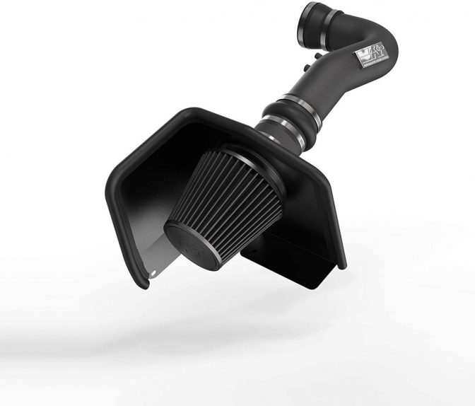 A black microphone with a white background  Description automatically generated with low confidence